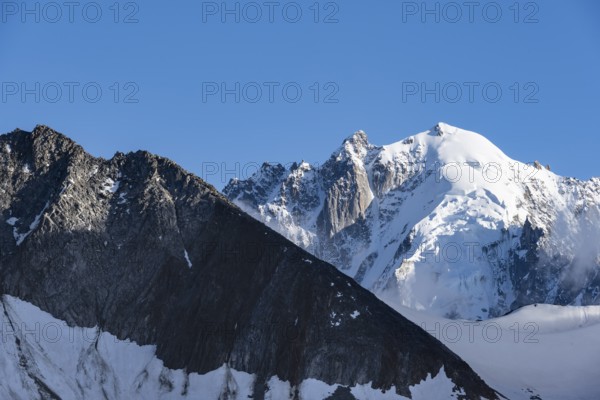 Summit of the Aiguille Verte, High alpine mountain landscape with glacier and mountain peak,