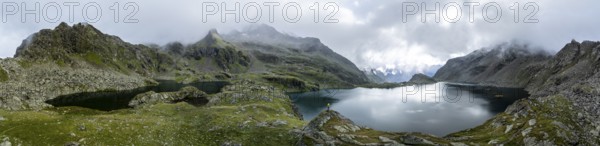 Mountain landscape with cloudy mountain peaks, mountain lakes Wangenitzsee and Kreuzsee, aerial