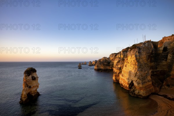 Colourful cliffs and rocks at sunrise on the beach, Praia da Dona Ana, Lagos, cliffs, Atlantic