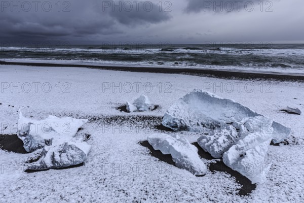 Ice floes on the beach, snowy, waves, sea, clouds, winter, Diamond Beach, Breidamerkursandur,