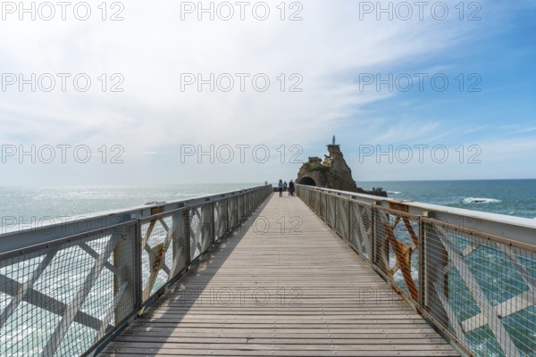 Wooden bridge together to Plage du Port Vieux in Biarritz, holiday in south-eastern France.