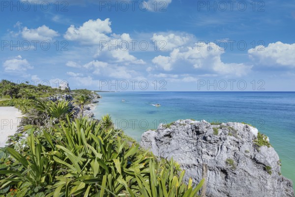 Tulum Archaeological Zone with Mayan pyramids and ruins located on the scenic ocean shore of