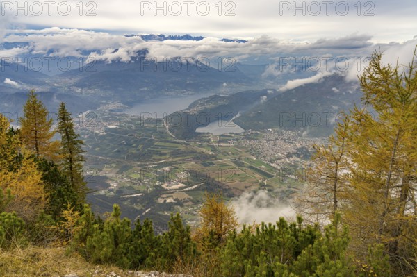 View from the summit of Mount Pizzo di Levico to the lakes in the Sugana Valley, Trentino, Italy,