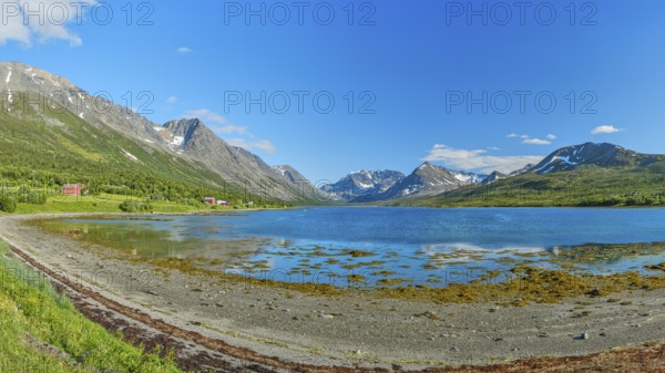 Lyngen Alps at the Lyngenfjord, Lyngen Alps, mountains with snow, blue sky, European North Sea,