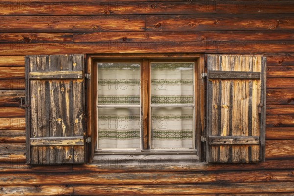 View of the window of a hut on the Glatsch Alm, Dolomites, Puez-Geisler nature park Park, Odle