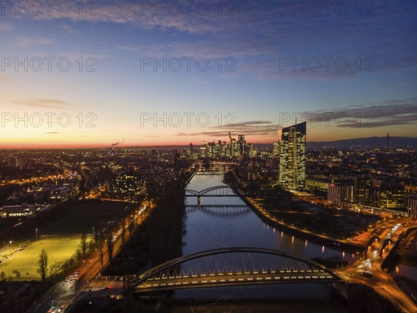 The lights in the offices of the European Central Bank (ECB) and in the skyscrapers of Frankfurt's