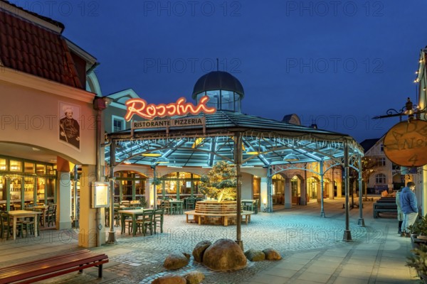 The Italian restaurant Rossini in the Baltic seaside resort of Kühlungsborn at dusk,