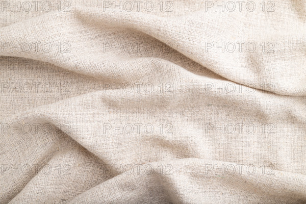 Fragment of white linen tissue. Side view, natural textile background and texture. wave concept,
