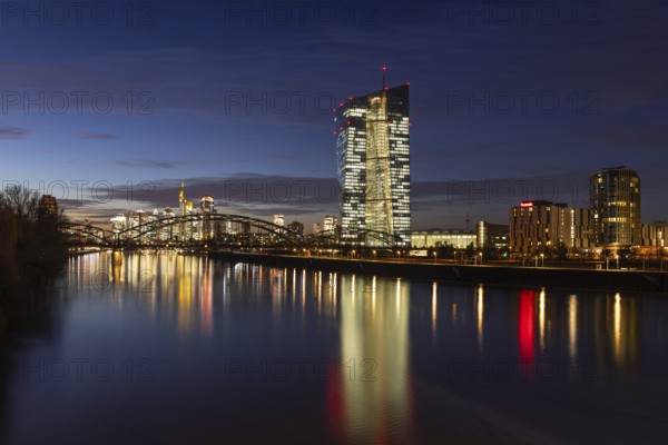 The lights in the offices of the European Central Bank (ECB) and in the skyscrapers of Frankfurt's