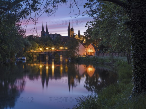 Merseburg Cathedral and Merseburg Castle reflected in the River Saale at dawn, Merseburg,