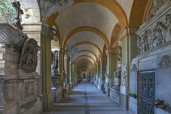 Arcade with tombs at the Monumental Cemetery, Cimitero monumentale di Staglieno), Genoa, Italy,