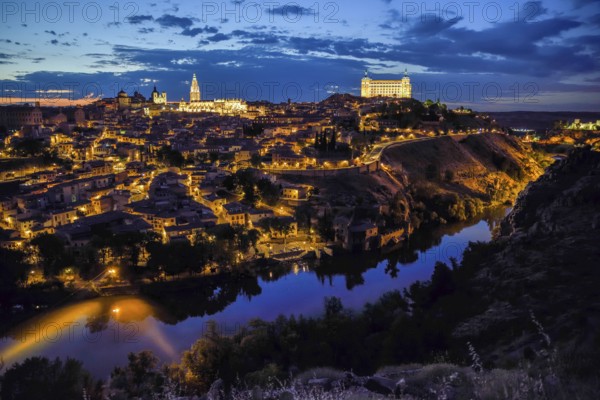 City view of Toledo with the river Tajo, blue hour, province Toledo, region Castilla-La Mancha,