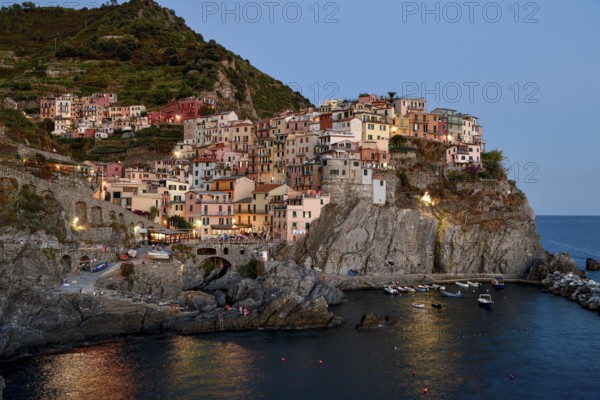 Fishing village of Manarola, blue hour, district of Riomaggiore, Cinque Terre, province of La