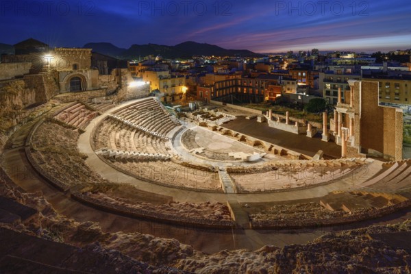Teatro Romano, blue hour, Roman amphitheater, in the old town of Cartagena, Murcia region, Spain,