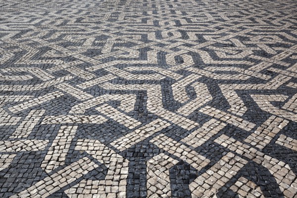 Portuguese mosaic paving, black and white paving motif, Praça dos Restauradores, Lisbon, Portugal,
