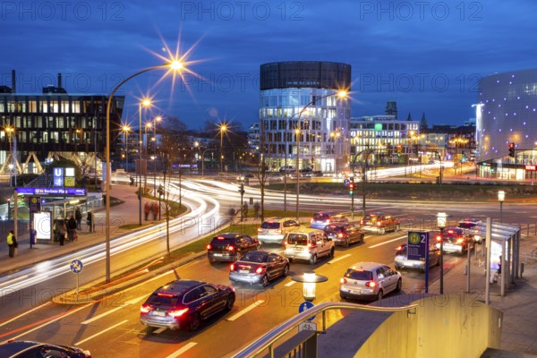 Evening city centre traffic in Essen, large intersection, roundabout, Berliner Platz, this area