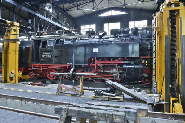 Steam locomotive of the Harz narrow gauge railway for maintenance in the workshop, Wernigerode,