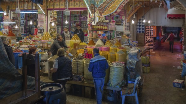 Market stall with dried spices and herbs in the covered souk in the centre of Meknes, Meknes,