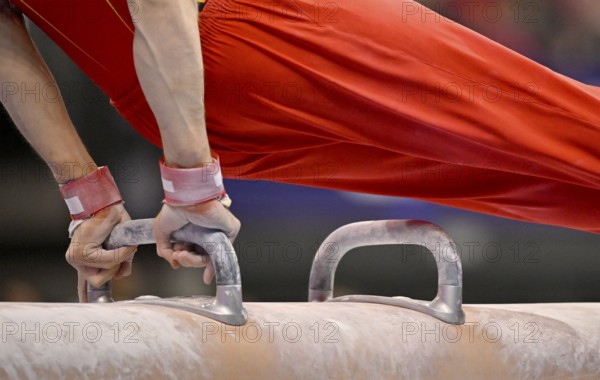 Feature detail close-up Senne Spyckerelle BEL pommel horse action gymnastics, EnBW DTB-Pokal,
