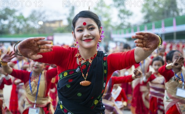 Participants with an instructor dance on the final day of a Bihu dance workshop ahead of Rongali