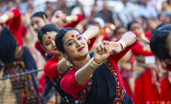 Participants with instructors dance on the final day of a Bihu dance workshop ahead of Rongali Bihu