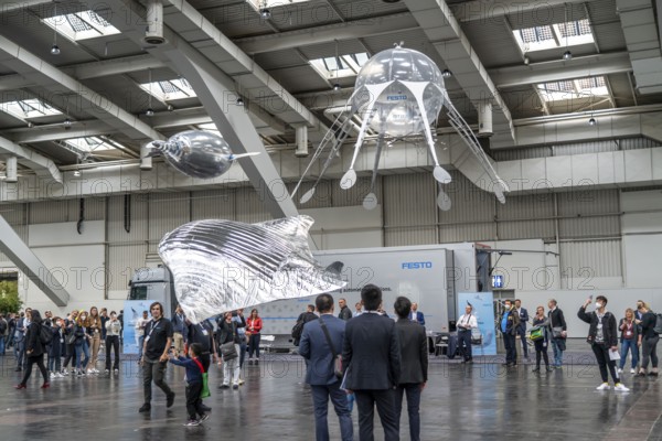 Mechanical flying objects, filled with helium, controlled by fine mechanics, movements copied from