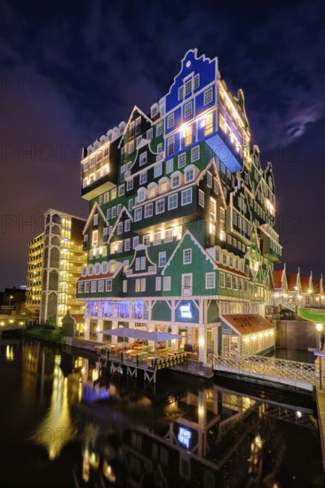 ZAANDAM, NETHERLANDS, MAY 21, 2018: Inntel Hotel in Zaandam illuminated at night. Design of