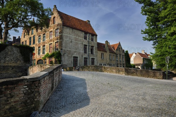 Bruges typical Belgian cityscape Europe tourism concept, canal and old houses and bridge. Brugge,