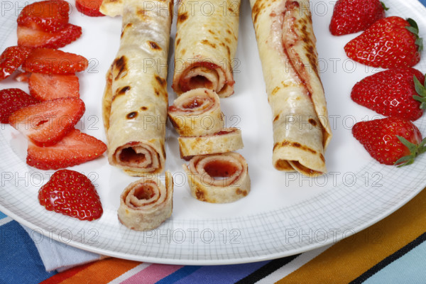 Swabian cuisine, filled pancakes, Flädle with strawberry jam, Gsälz, fresh strawberries, sweet,