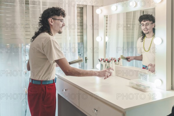 Makeup artist disinfecting and sanitizing workstation with spray bottle in beauty salon, getting
