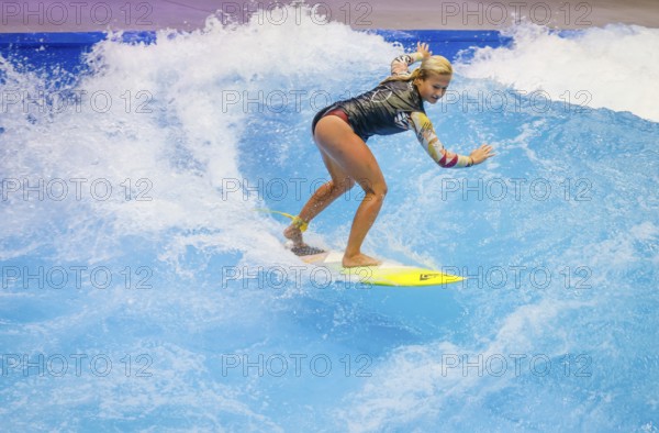 Messe boot Düsseldorf, Surfer riding a standing indoor wave on the occasion of a press event,