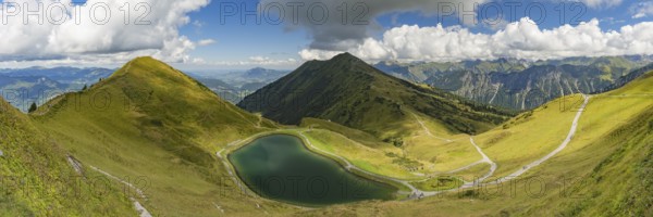 Riezler Alpsee, an artificial lake, snow pond, feeds the snow cannons that provide complete snow