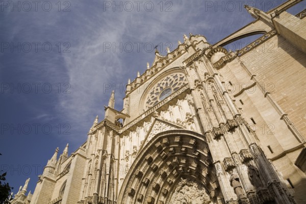 Architectural details on the outside of The Cathedral of Saint Mary of the See or Seville