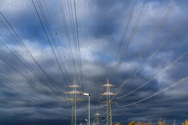 High-voltage pylons, overhead lines, with warning paint for air traffic, near Krefeld, North