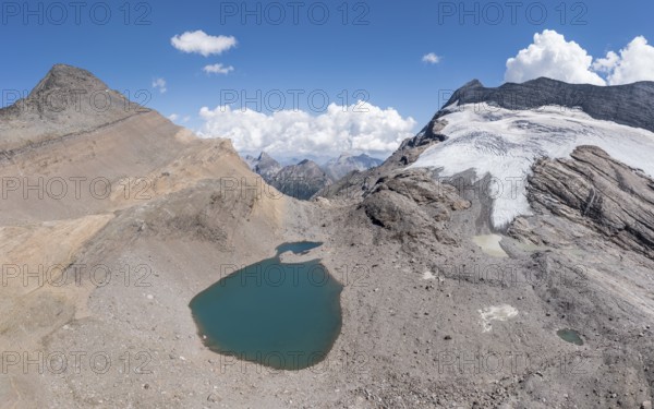 Panorama aerial view of glacial lake, SAC hut monte leone, near Simplon mountain pass, Switzerland,