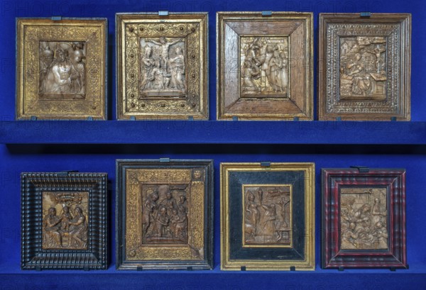 Flemish high relief artworks in the alabaster cabinet at Kasteel van Gaasbeek, renovated medieval