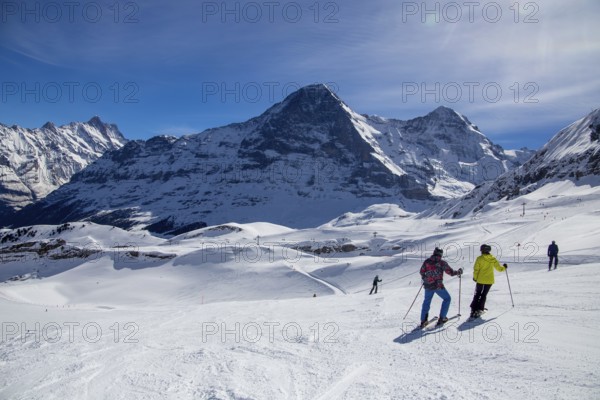 25 March 2024: Skiing against the backdrop of the north face of the Eiger in Grindelwald,