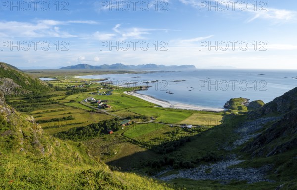 View of the coast with the village of Stave, beach and sea, hike to the summit of Måtind, Andøya