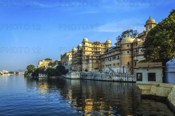 Romantic India luxury tourism concept background, Udaipur City Palace and Lake Pichola. Udaipur,