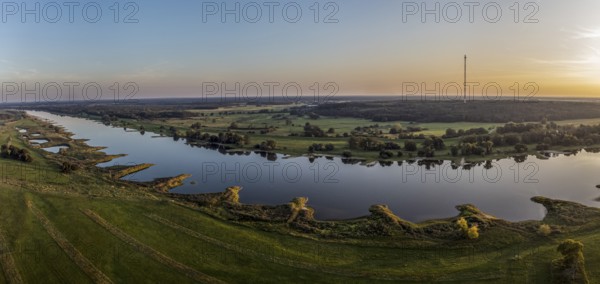 Panorama aerial view of river Elbe near Lenzen, view towards Höhbeck radio mast, calm summer