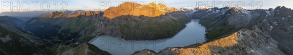 Alpine panorama with Pigne d'Arolla, Lac de Dix, sunset in the mountains, reservoir, Valais Alps,