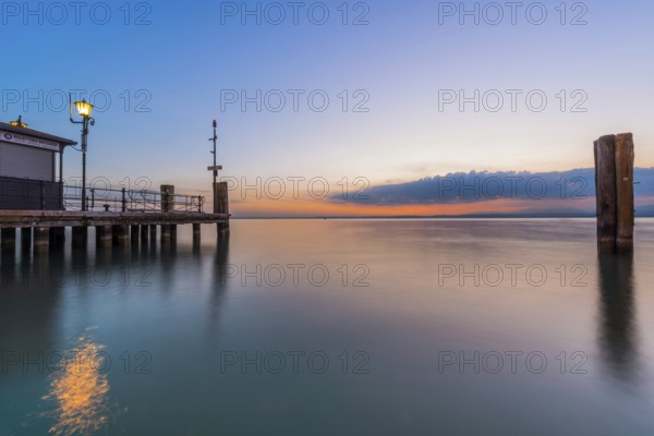 Evening atmosphere in the harbour, lake, water, tourism, travel, sunset, jetty, Lazise, Lake Garda,