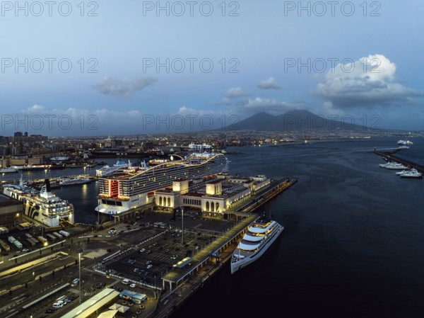 Naples Ferry Terminal at night from a drone, Molo Immacolatella Vecchia, Naples, Campania, Italy,