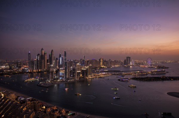 Night shot, view from The View At the Palm viewing platform of skyline with Princess Tower, Elite