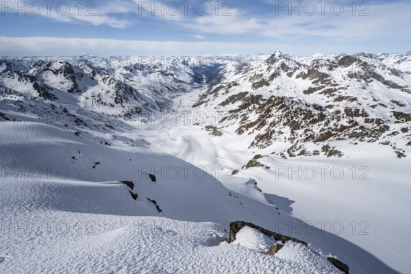 View from the summit of Piz Grialetsch in winter, mountain panorama with Dürrboden valley and view