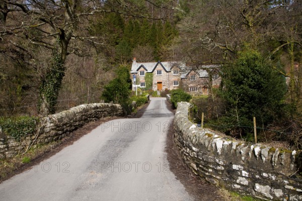Packhorse bridge traditional village cottages, Brendon, Exmoor national park, Devon, England,