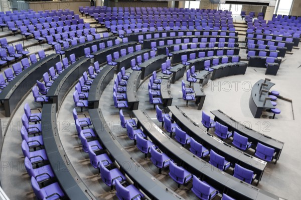 Empty plenary chamber in the German Bundestag, equipped with office swivel chairs in the special