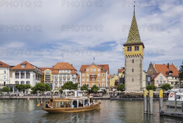 Harbour of Lindau, town view with man tower from excursion boat. Lindau, Lake Constance, Bavaria,