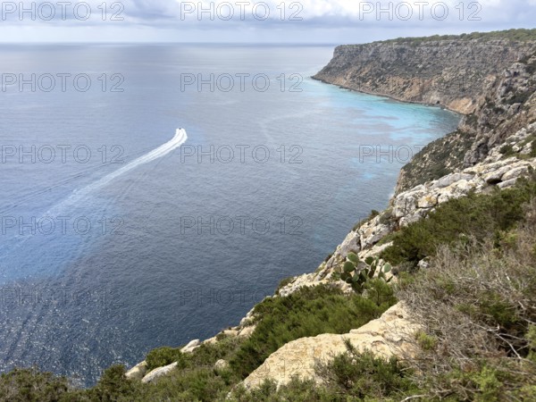 View of the rocky coast at the Far de la Mola lighthouse, eastern tip of Formentera, Balearic