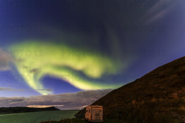 Northern Lights, (Aurora borealis) at a fjord in the Barents Sea near Bugoynes, September 2024,